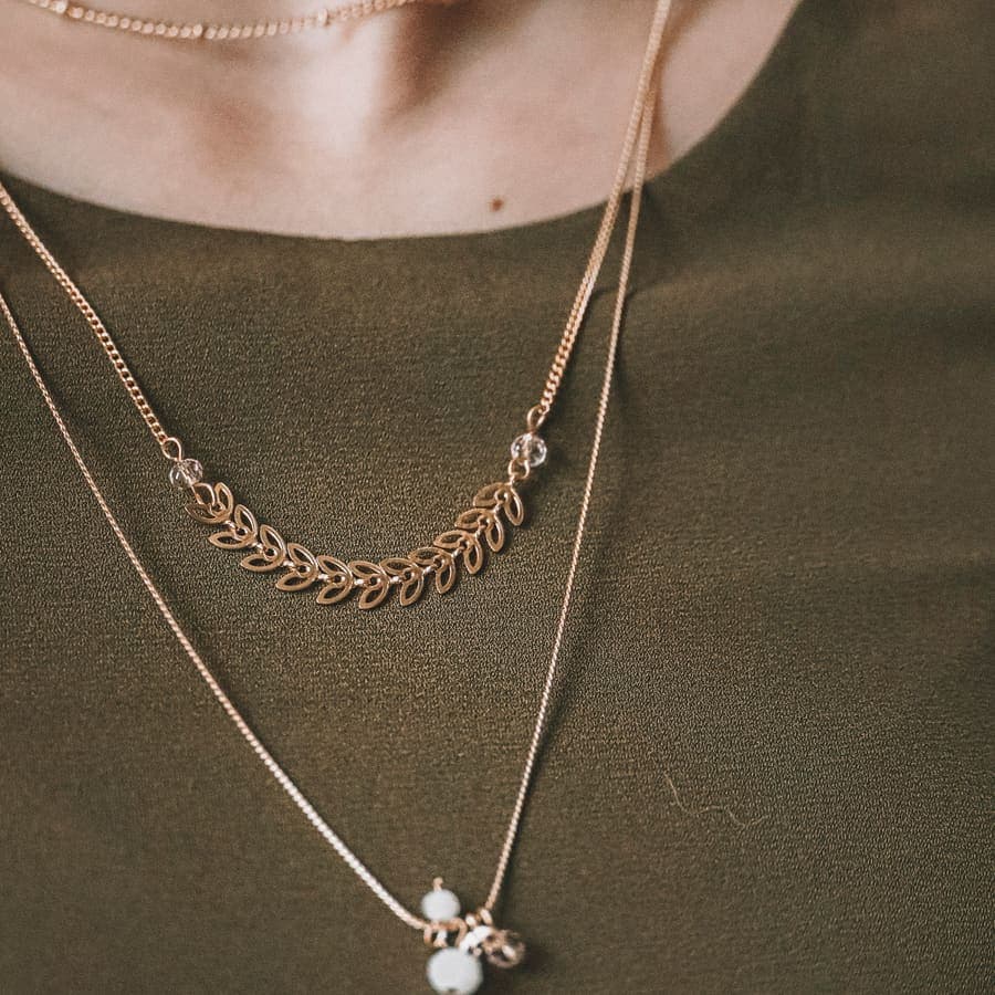 A silver T-bar pendant