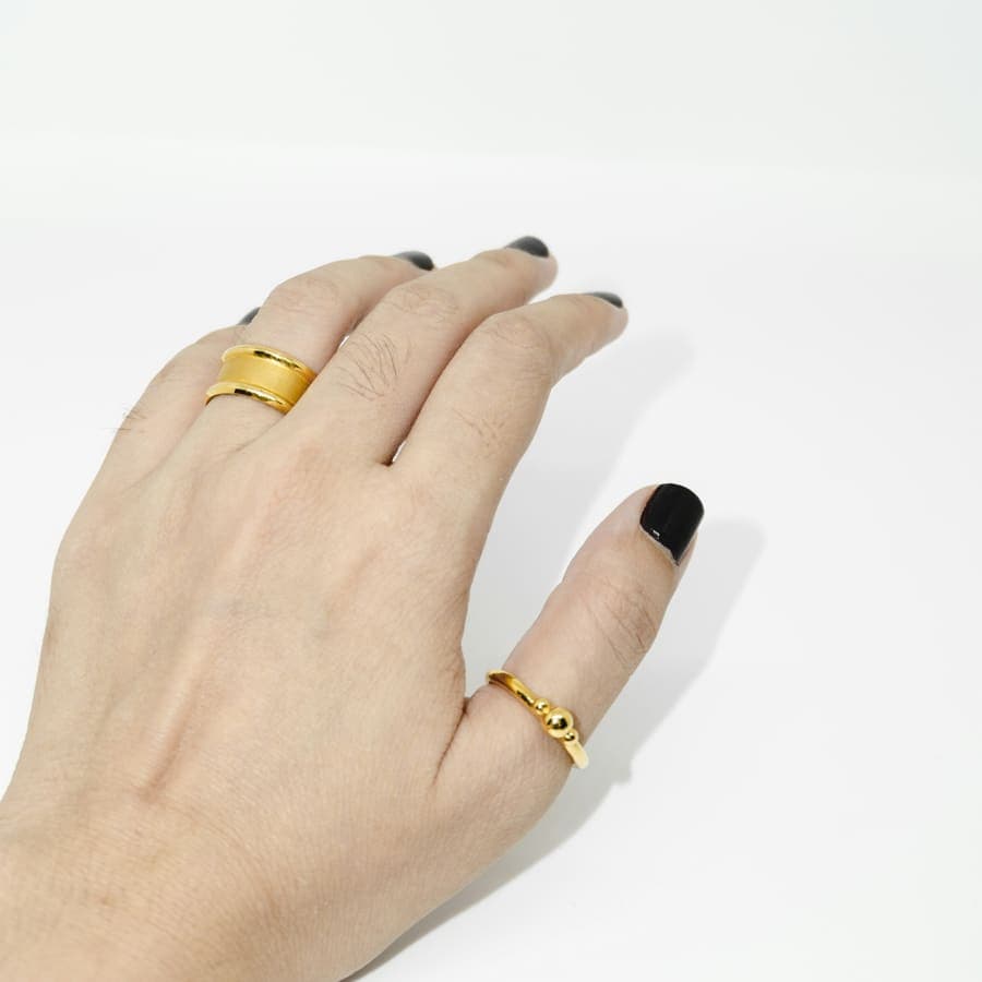 Two gold rings on one hand