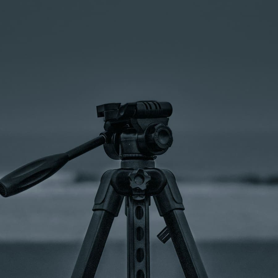 A tripod on the beach