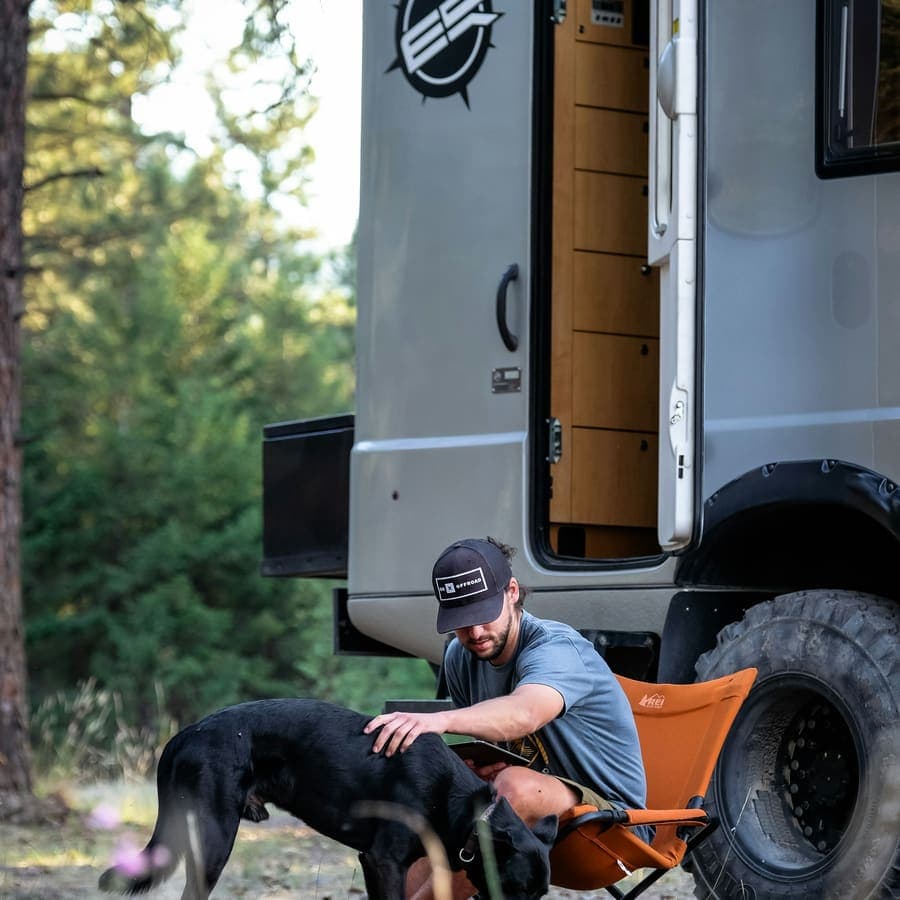 A camp chair beside the van